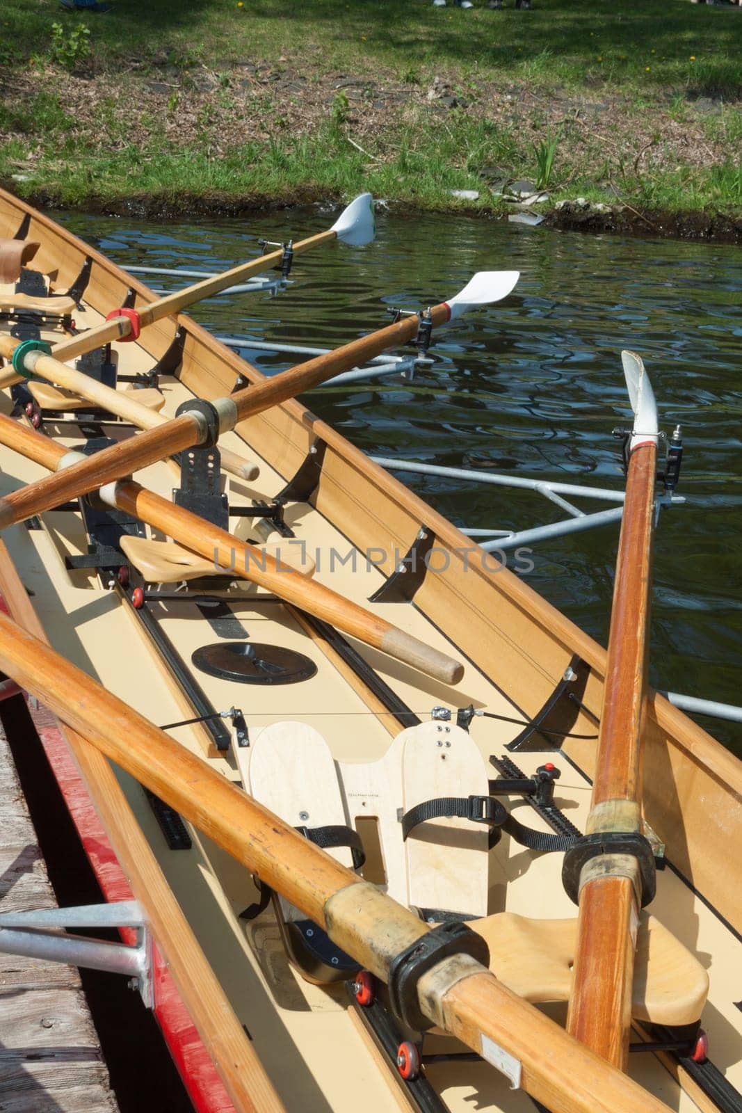 Rowing boat with rowing on a jetty