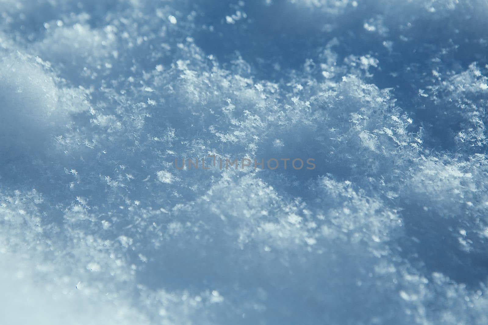 Macro photo of bright snow background