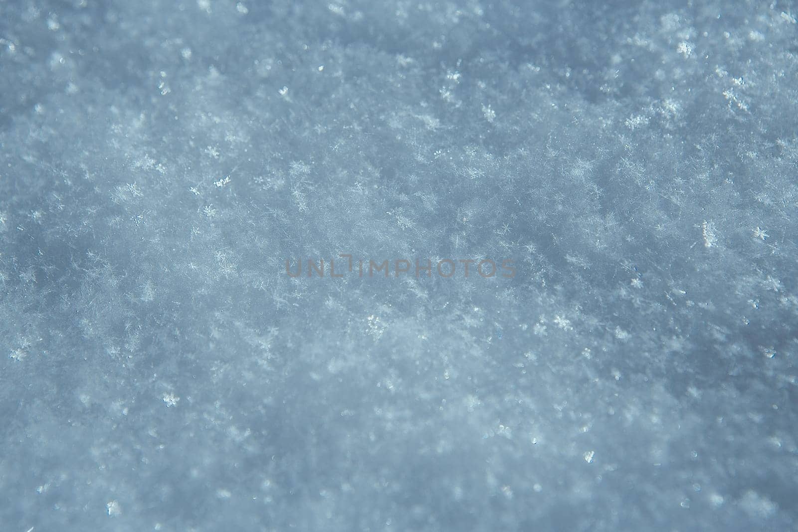 Macro photo of bright snow background