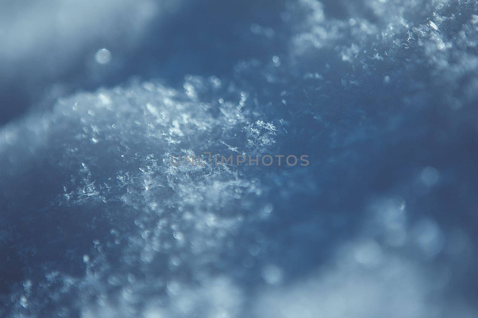 Macro photo of bright snow background