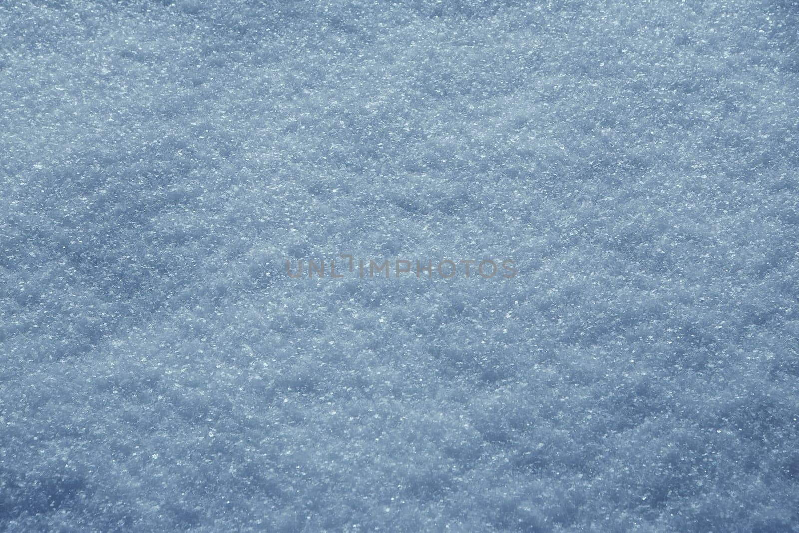 Macro photo of bright snow background