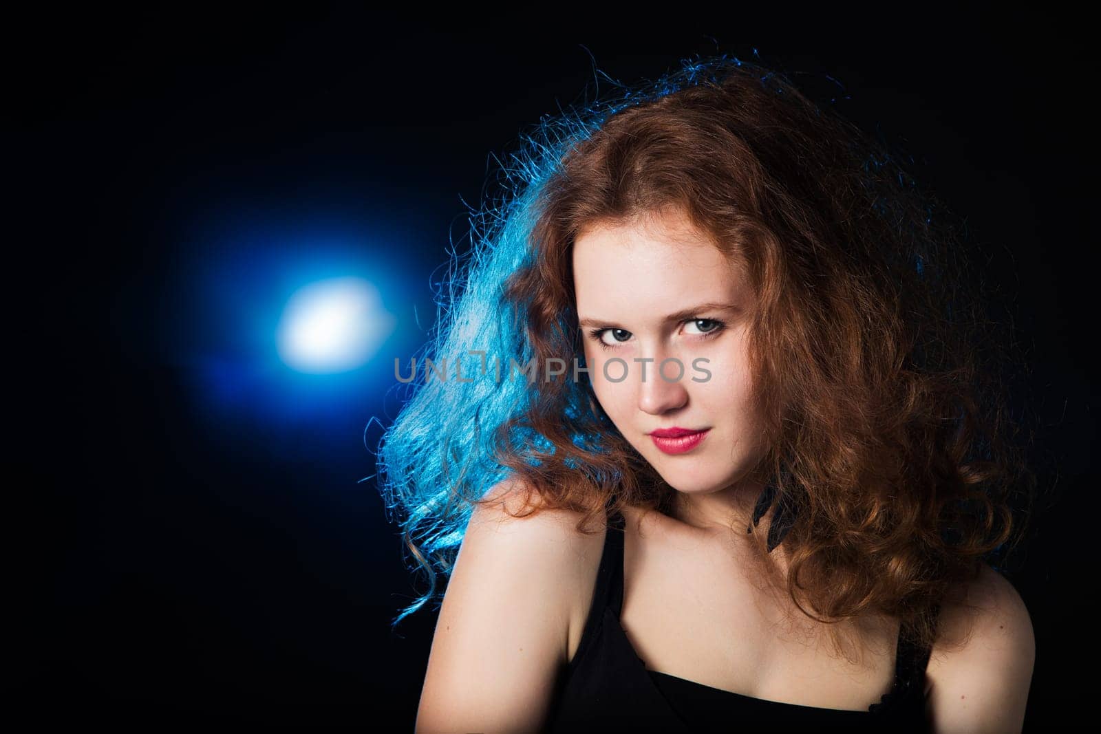 Beautiful Woman with Long Curly Hair