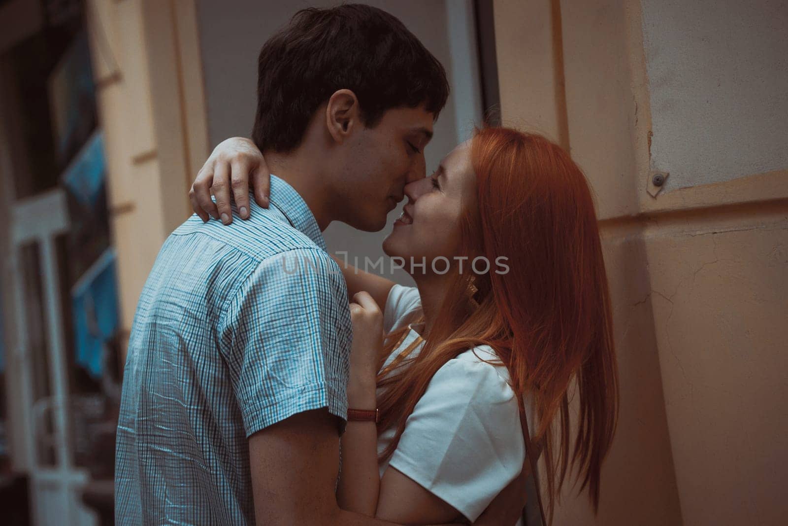 Young man kissing his lover's neck