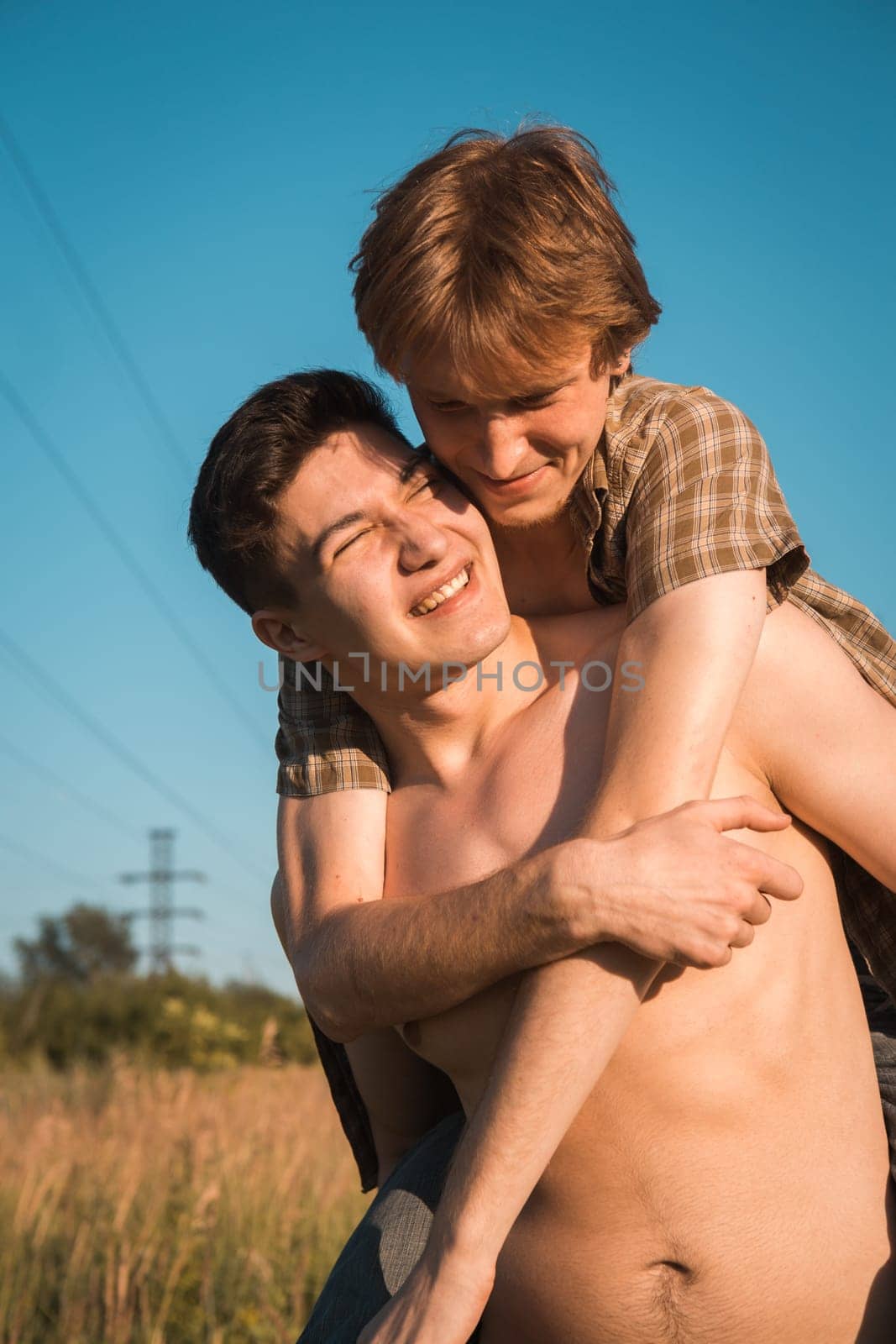 Portrait of a happy gay couple outdoors