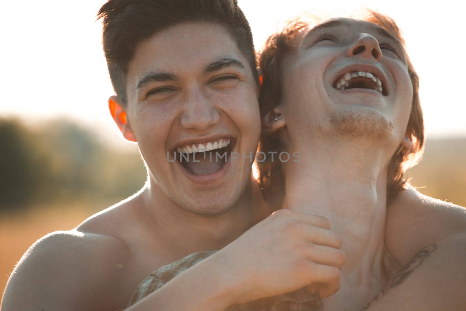 Portrait of a happy gay couple outdoors