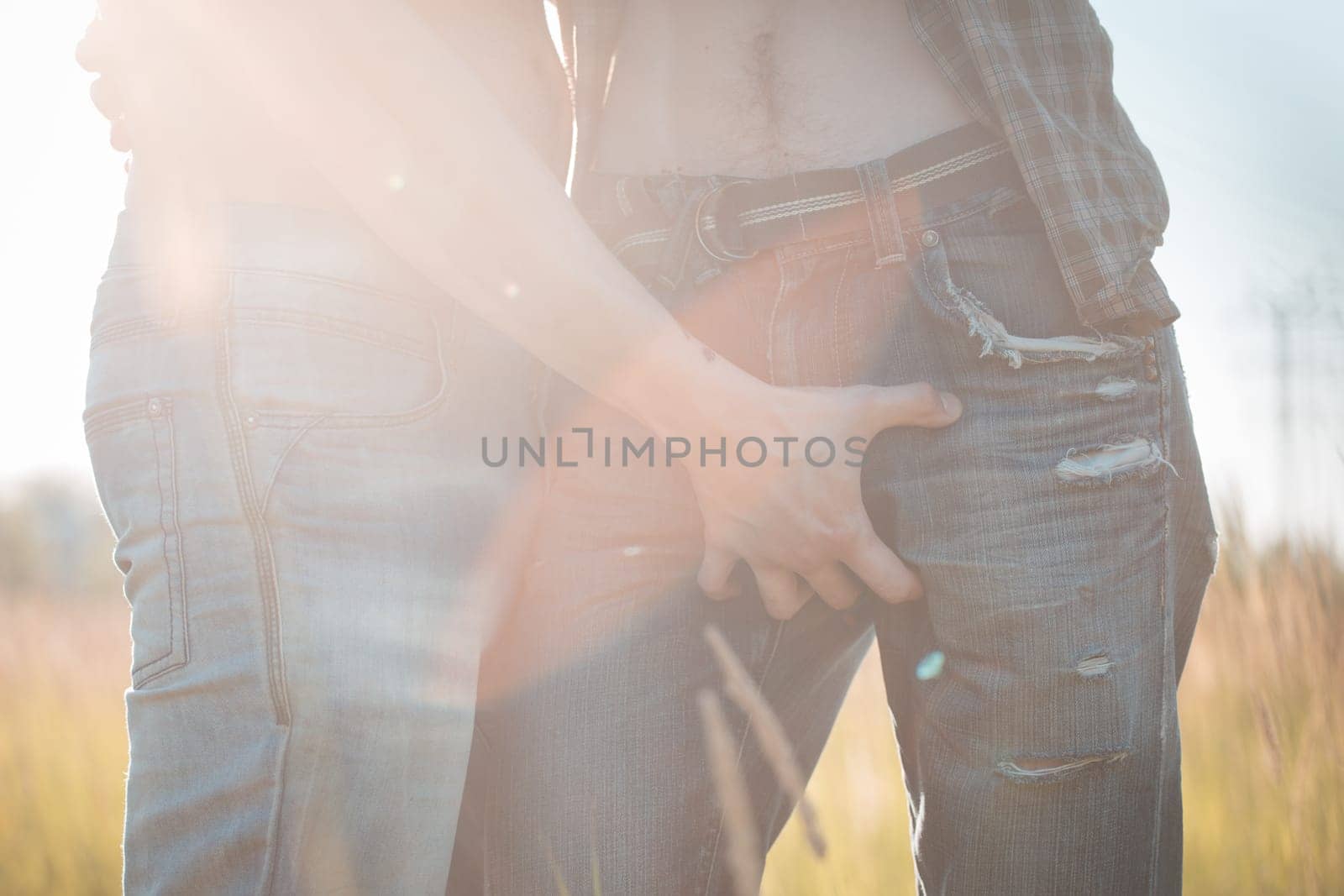 Gay man has his hand on penis