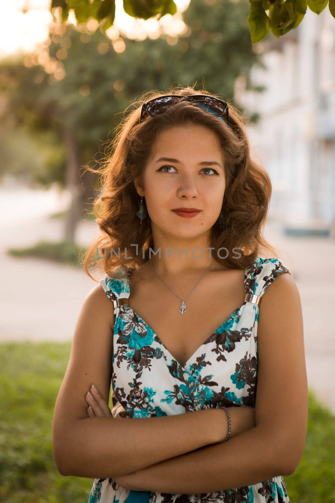 American redhead girl in suglasses. Photo in 60s style.