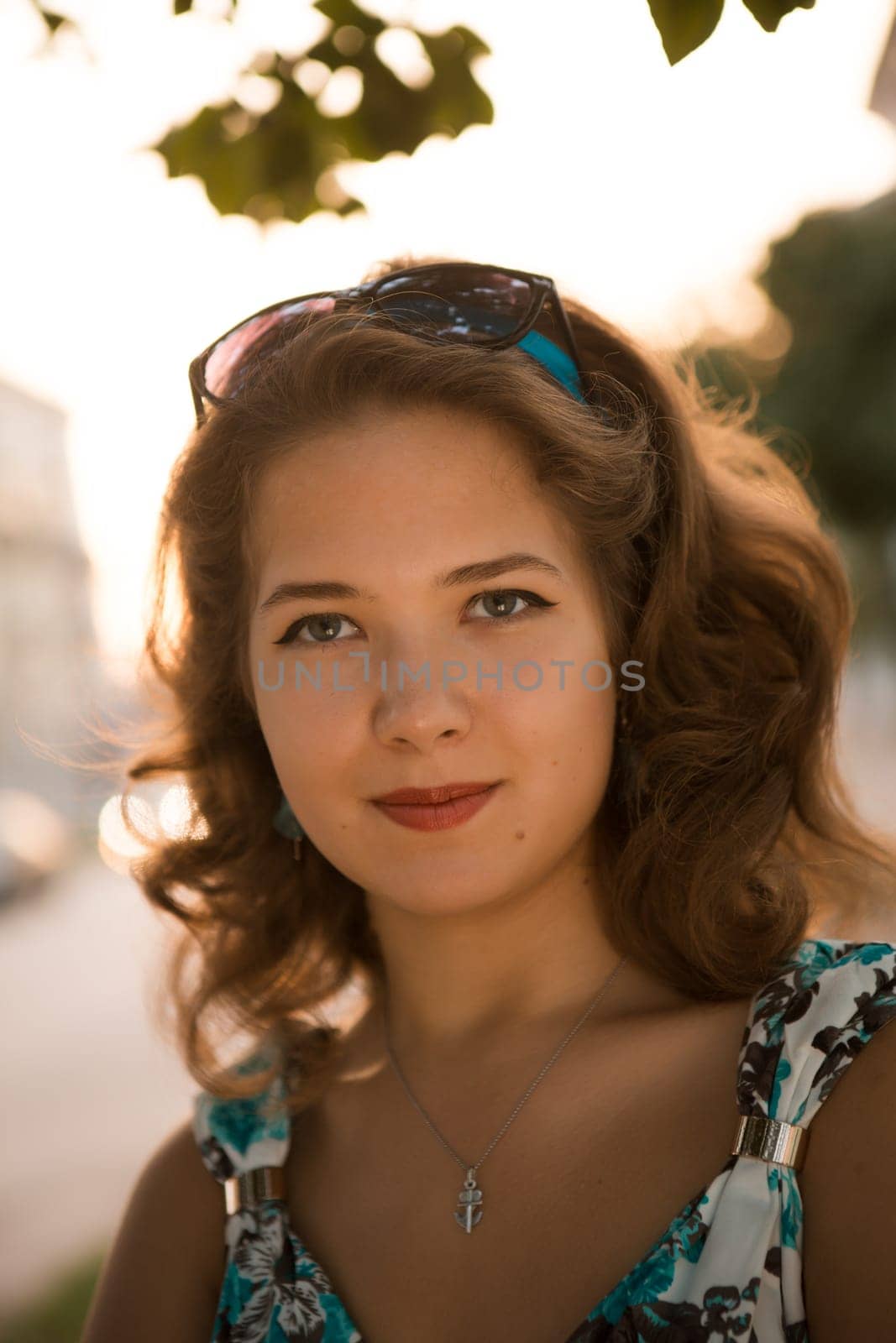 American redhead girl in suglasses. Photo in 60s style.