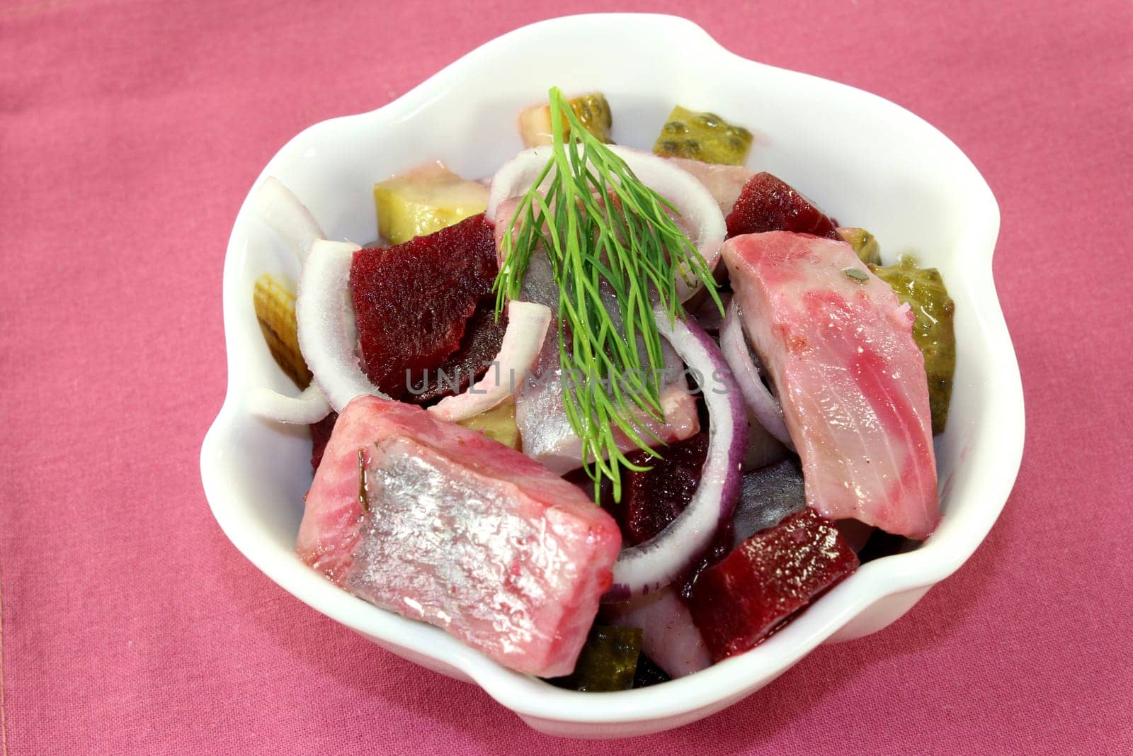 Matjessalat with beetroot,onions and sour cucumber