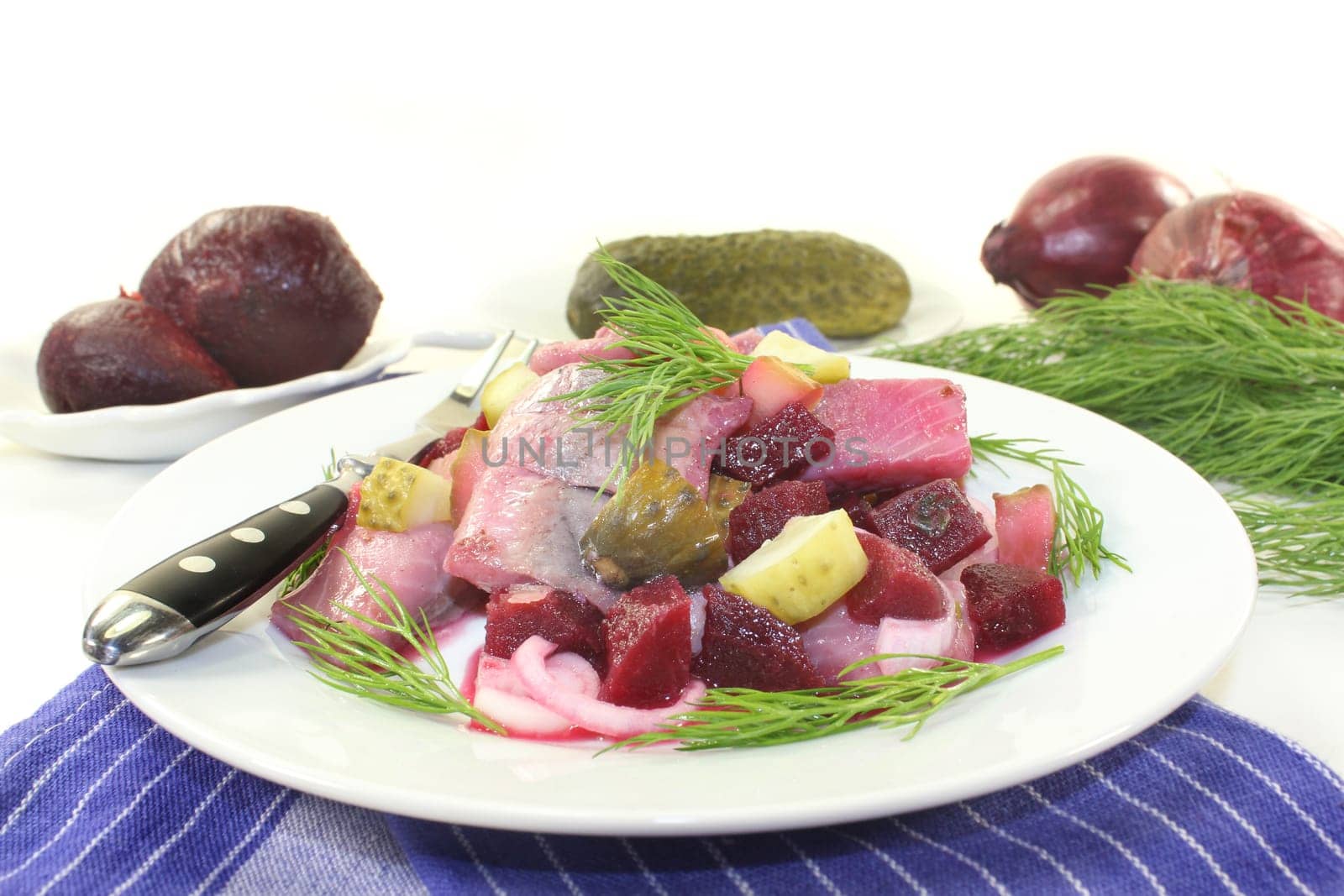 Matjessalat with beetroot,onions and sour cucumber