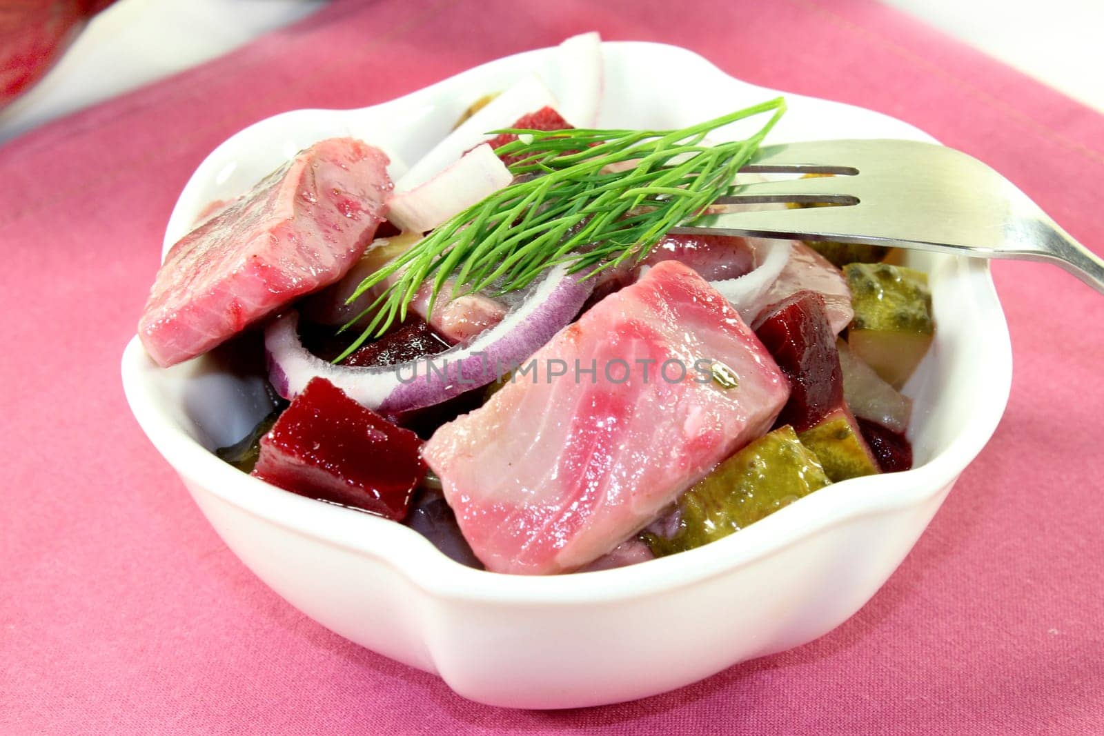 Matjessalat with beetroot,onions and sour cucumber