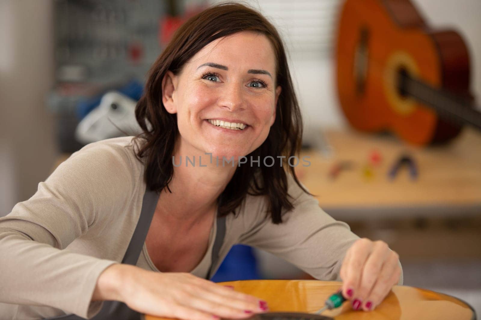 attractive emotional smiling woman in studio