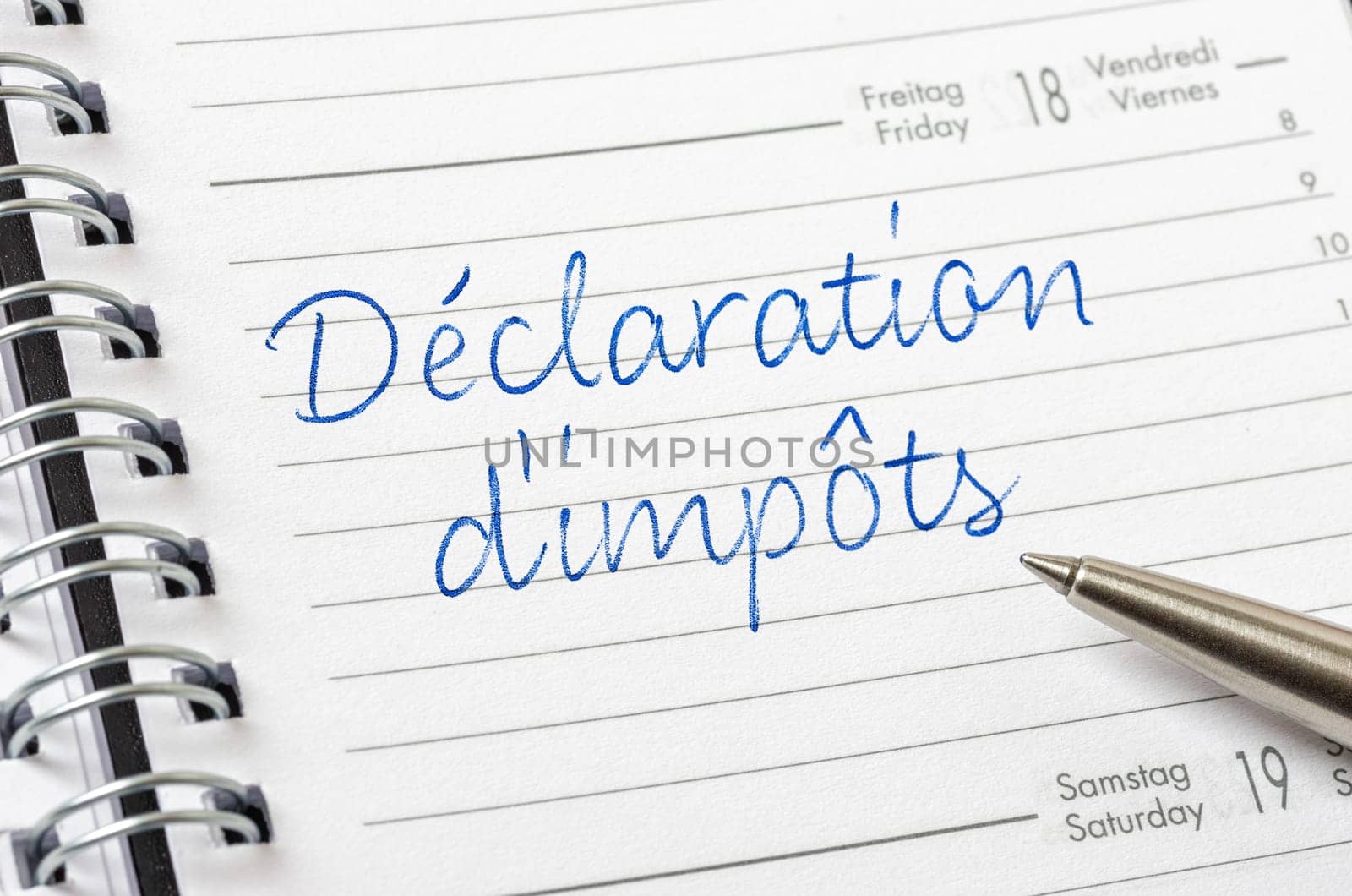 Daily planner with the entry Tax reporting in french - Déclaration d'impôt