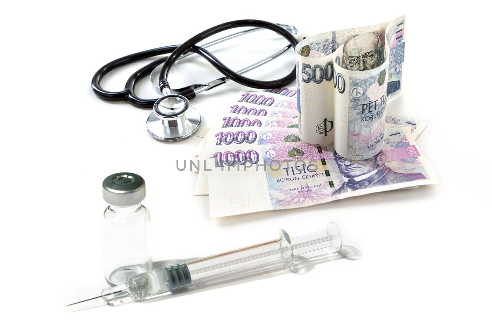 Czech paper money with heart on white background - stethoscope, heart, czech money 5000 and 1000, injection, syringe, vaccine, vaccination