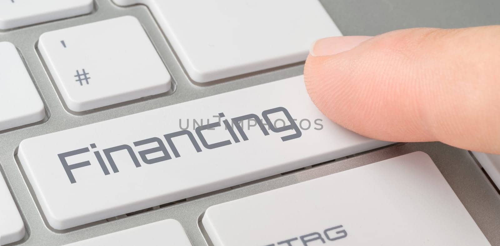 A keyboard with a labeled button - Financing