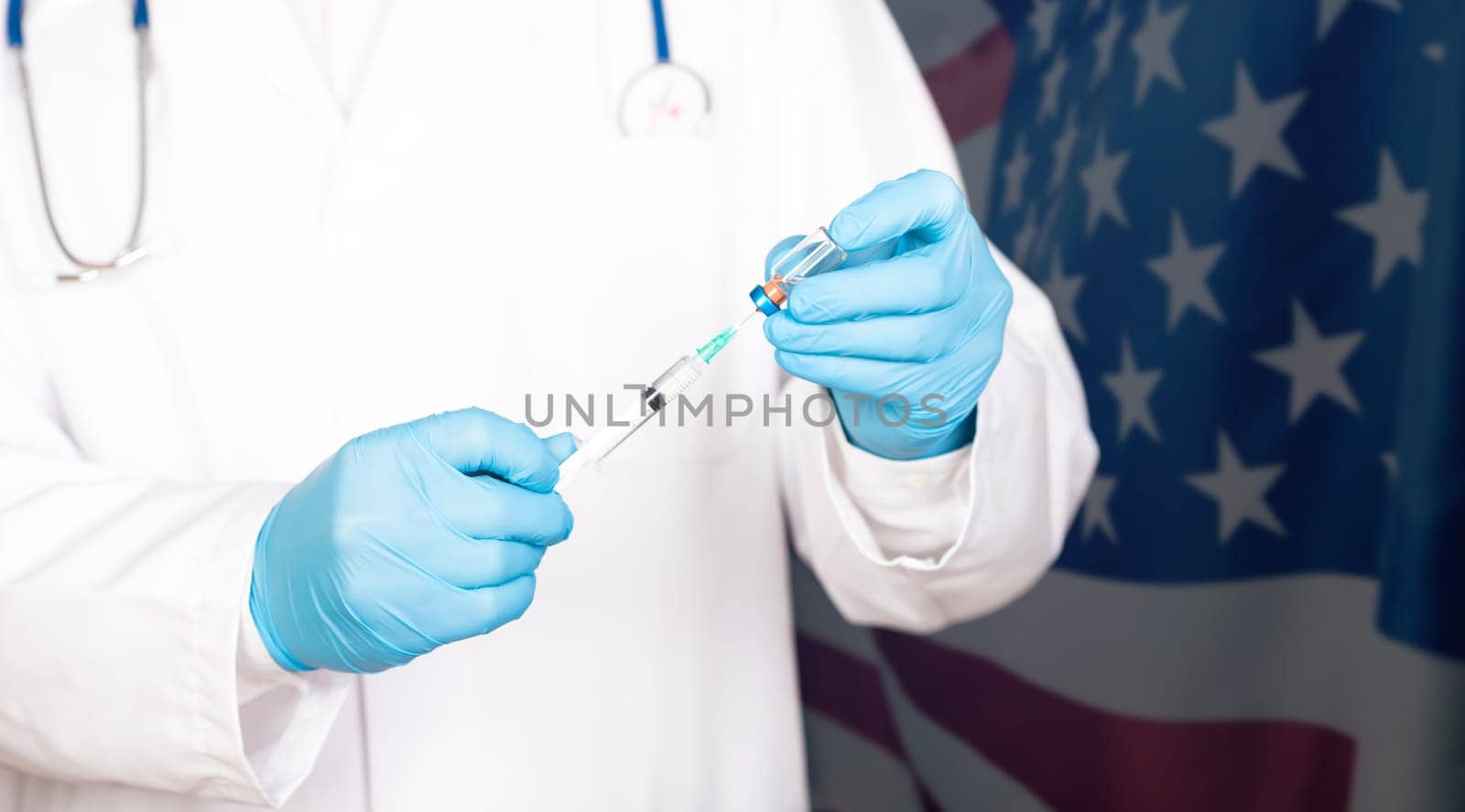 USA flag with doctor preparing for vaccine. Mass vaccination against the epidemic of coronavirus in USA  concept.