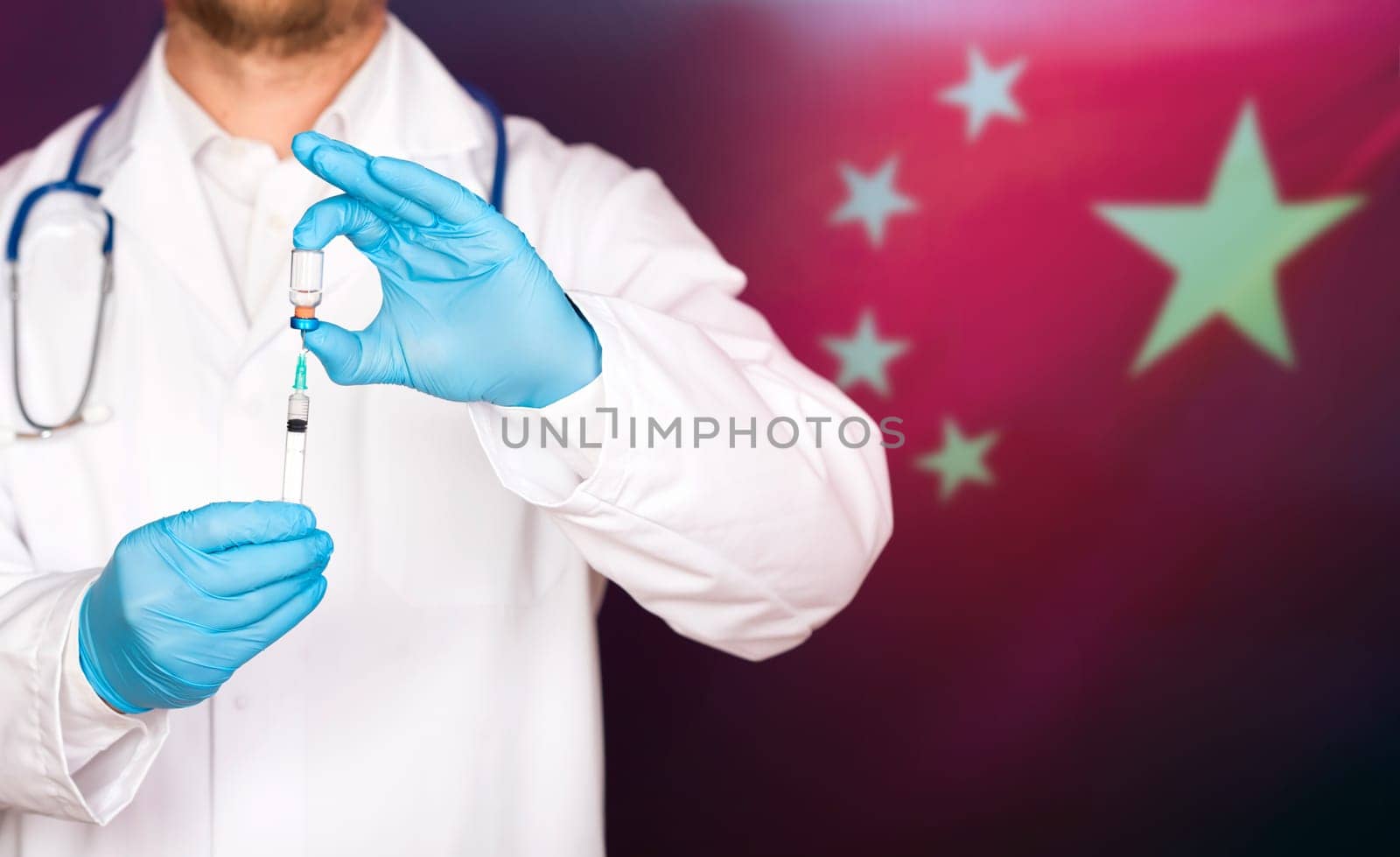 China flag with doctor preparing for vaccine. Mass vaccination against the epidemic of coronavirus in China concept.