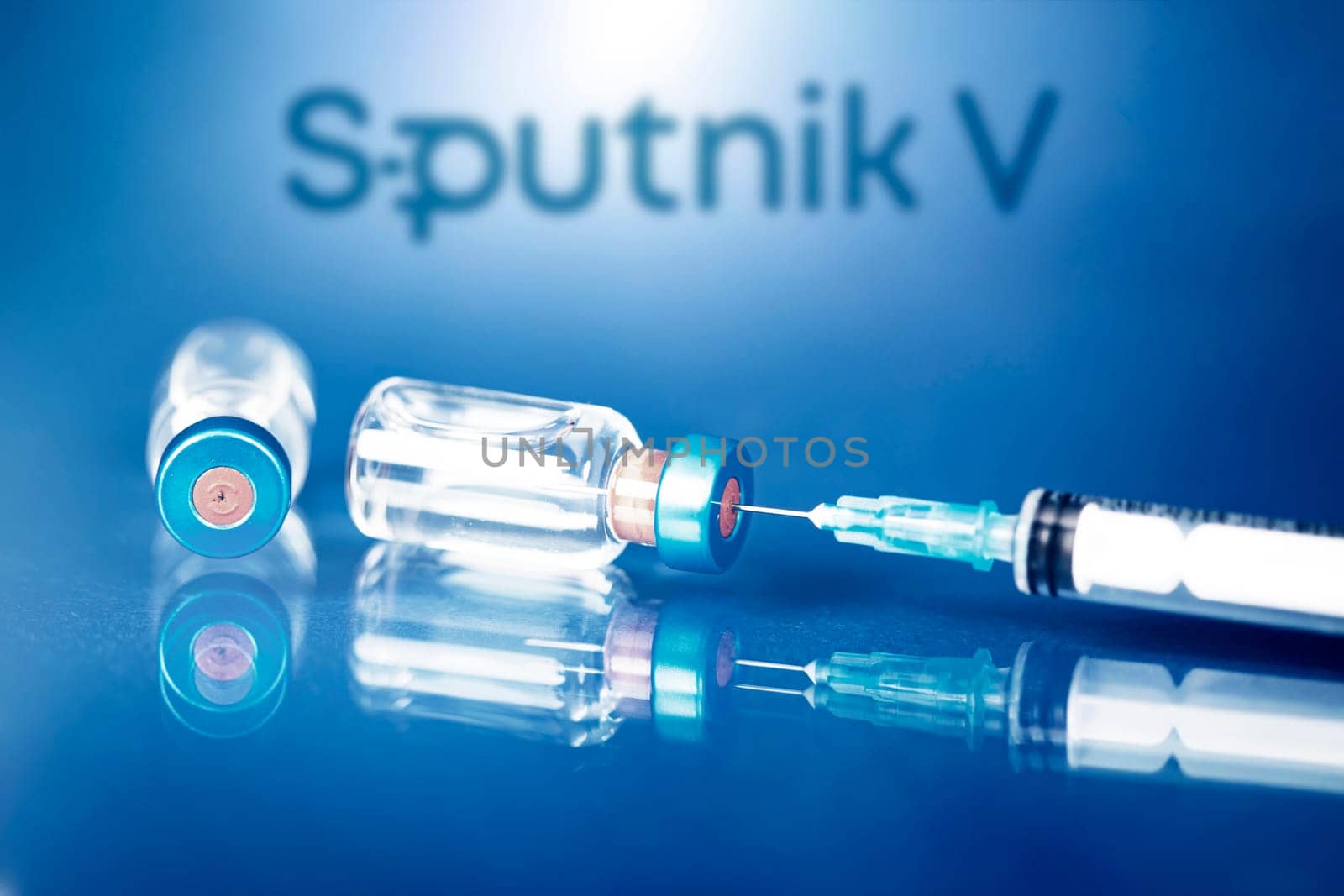 Cluj-Napoca, Romania - March 15, 2021:  New coronavirus vaccine Sputnik V concept, blurred Sputnik V logo on the background. Covid-19, 2019-nCov pandemic.