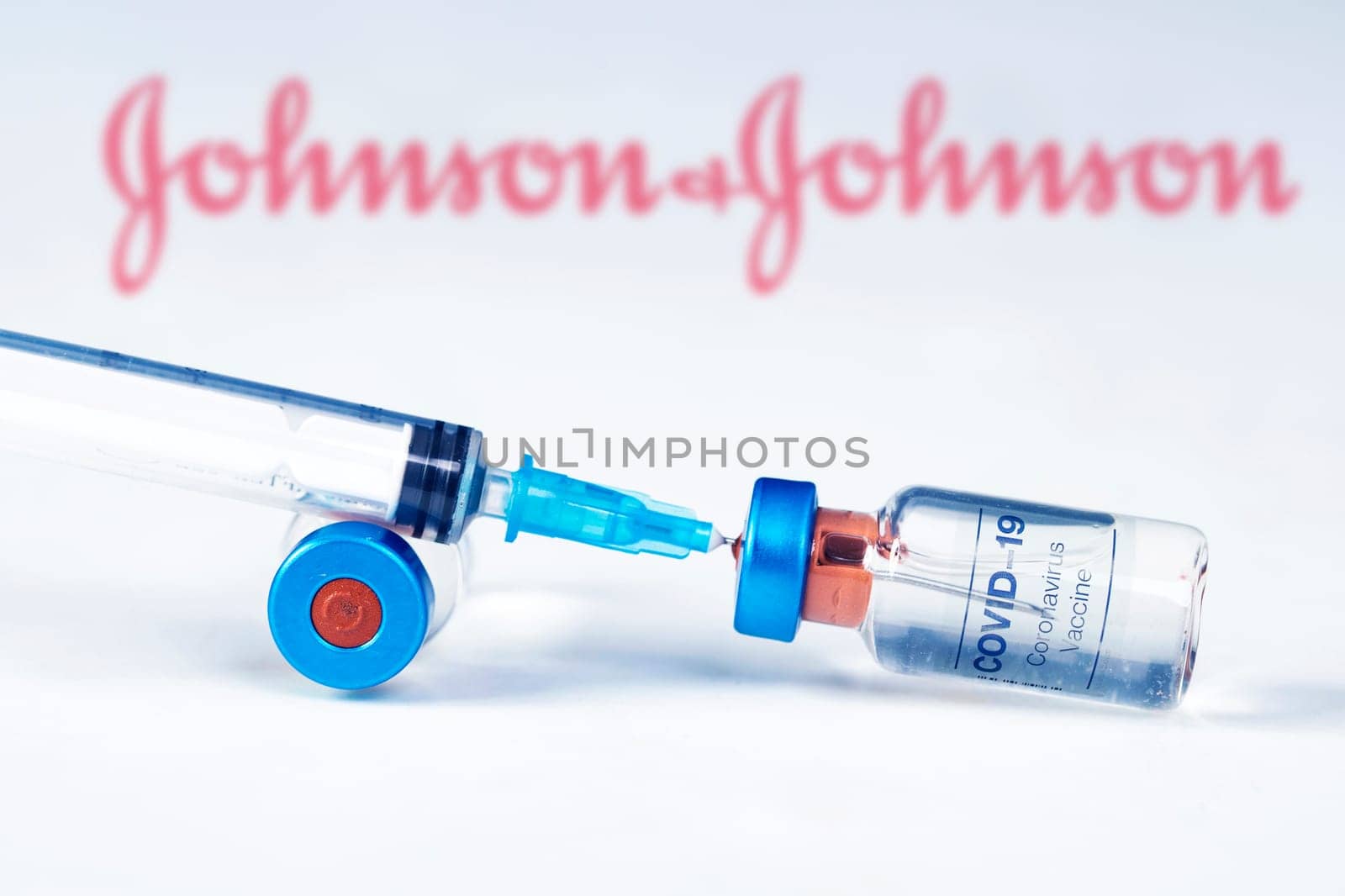 Cluj-Napoca, Romania - March 15, 2021:  New coronavirus vaccine Johnson and Johnson  concept, blurred Johnson and Johnson logo on the background. Covid-19, 2019-nCov pandemic.