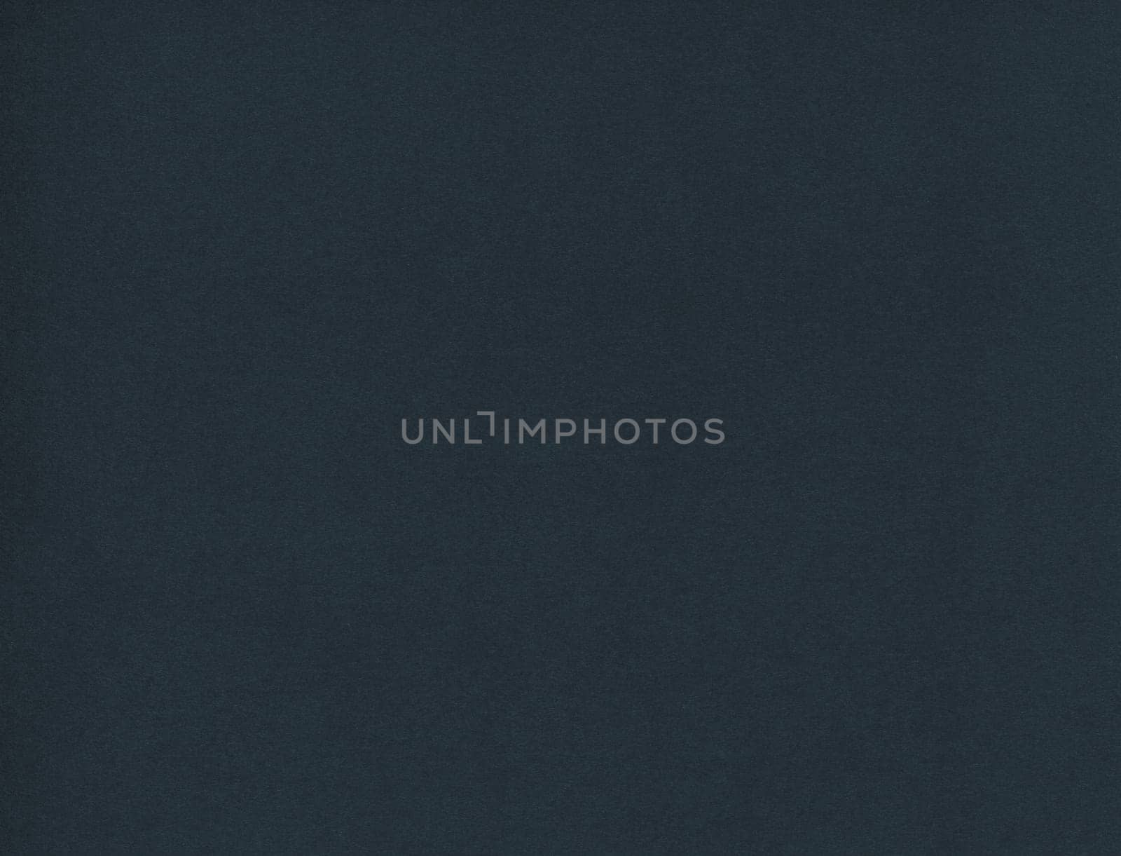 horizontal front view high resolution closeup detail of empty dark blue paper background texture