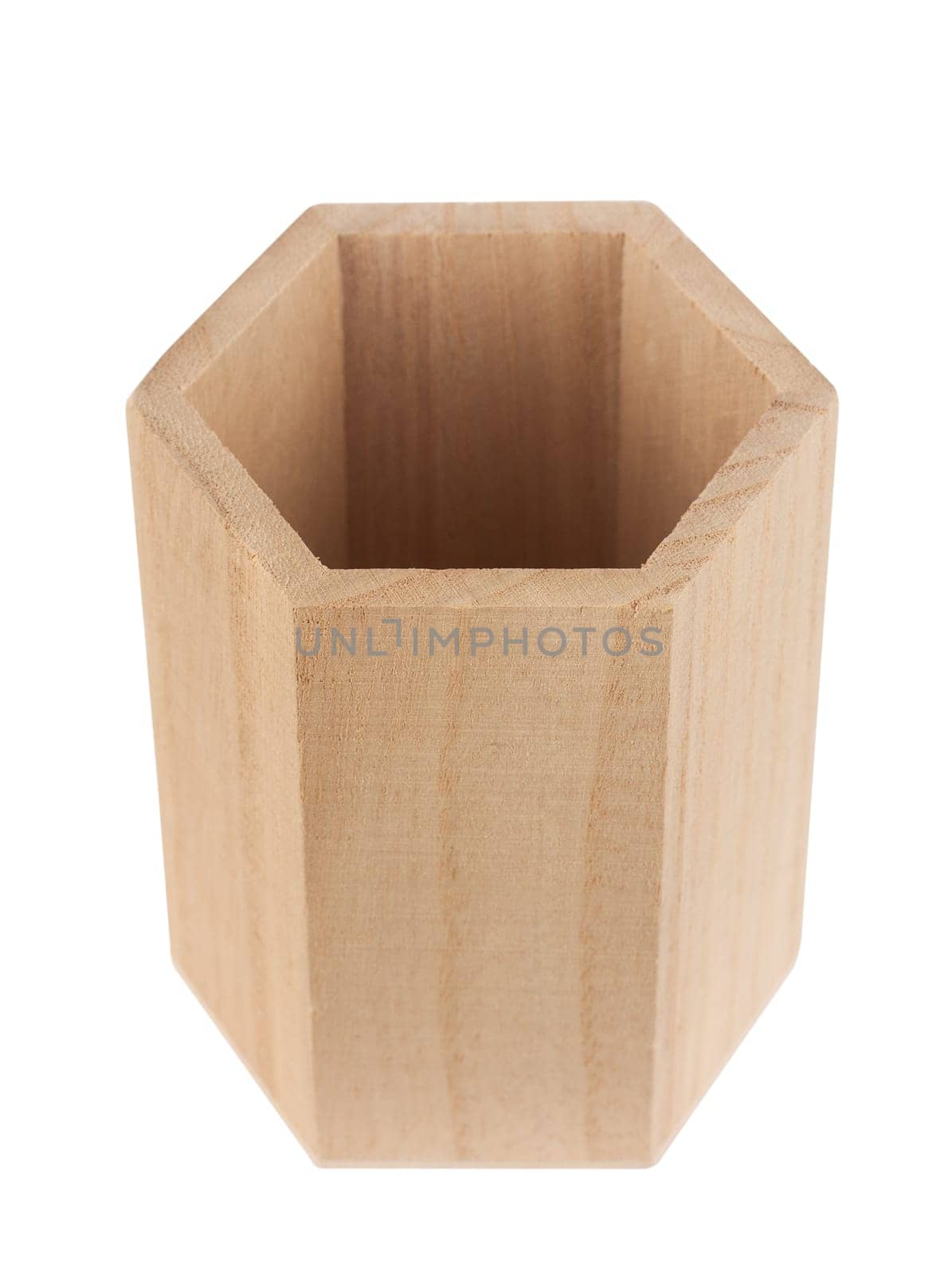 top view closeup of empty wooden hexagonal pencil desk holder isolated on white background