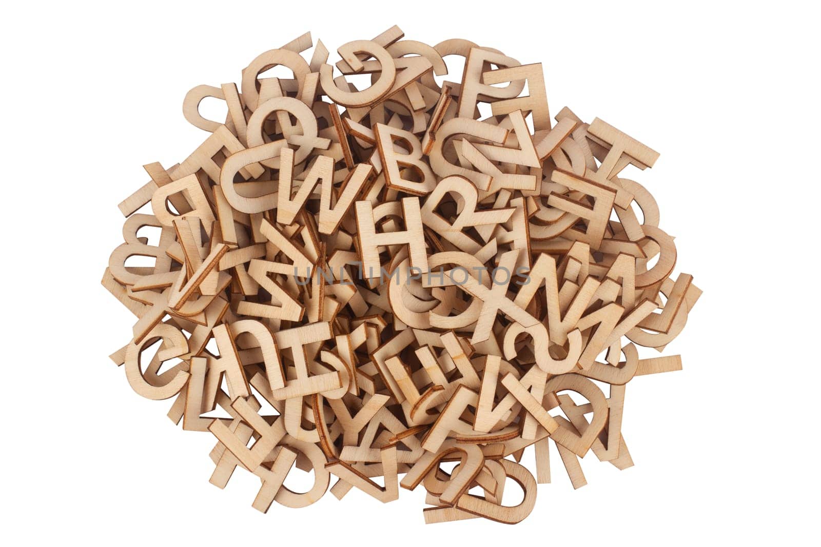top view closeup detail of pile of wooden cut small alphabet letters isolated on white background
