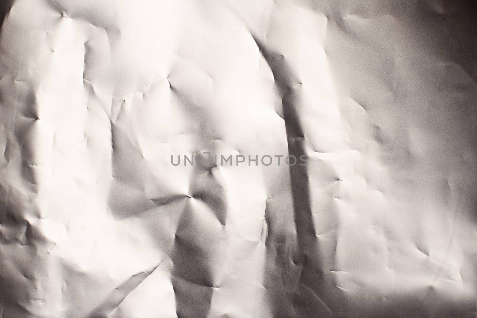 wrinkled silver aluminum foil background texture closeup