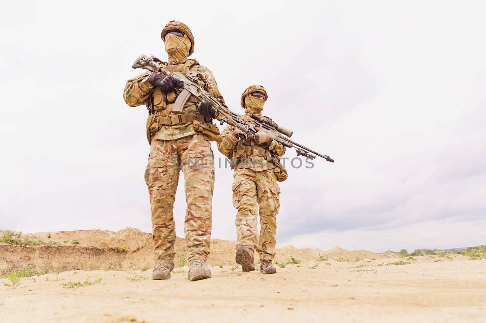 Equipped and armed special forces soldiers with rifles during army operation