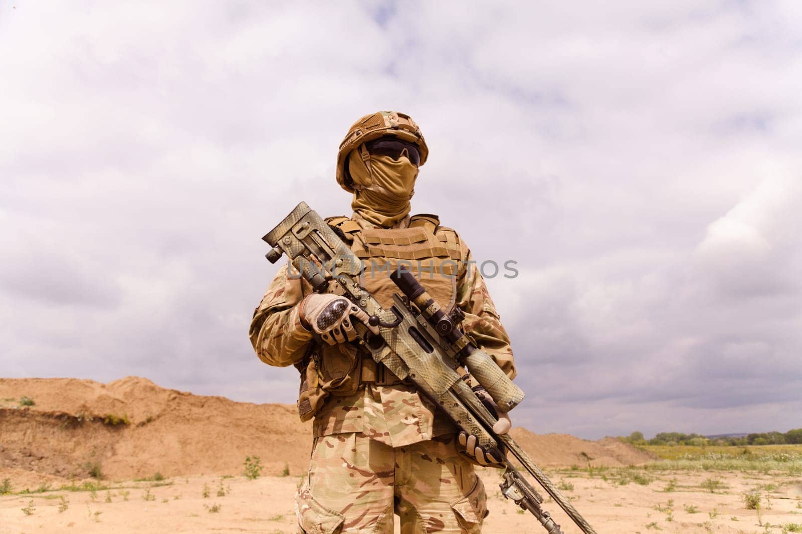 Equipped and armed special forces soldier with sniper rifle. Concept of military anti-terrorism operations, special operations of NATO forces.