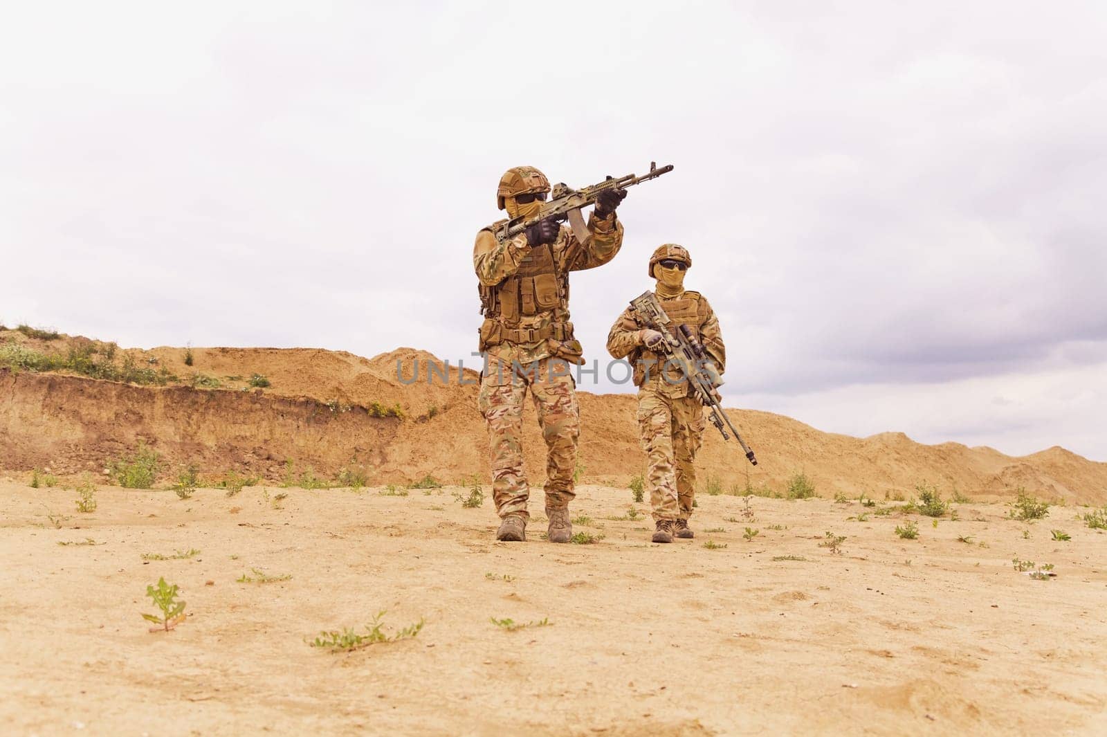 Equipped and armed special forces soldier in battlefield