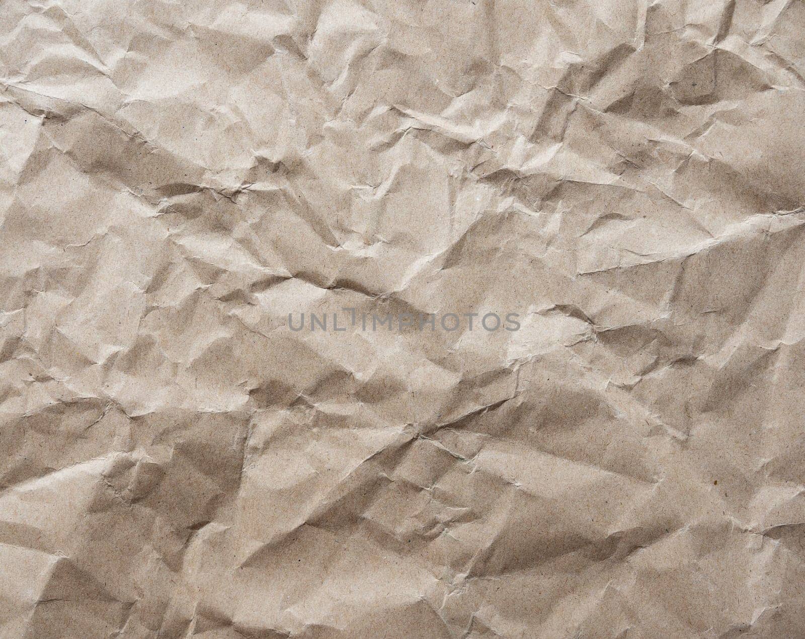 Kraft Paper texture background of brown crumpled recycled cardboard paper sheet