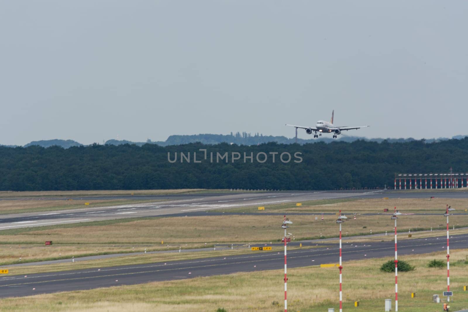 DUESSELDORF, NRW, GERMANY - JUNE 18, 2019:.Eurowing plane lands at Dusseldorf International Airport.