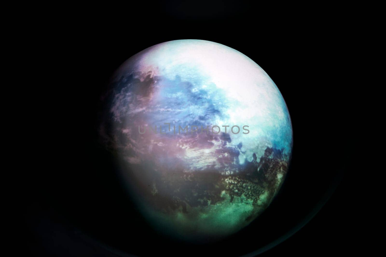 Image of planet earth on black background. Colourful, blue sea clouds