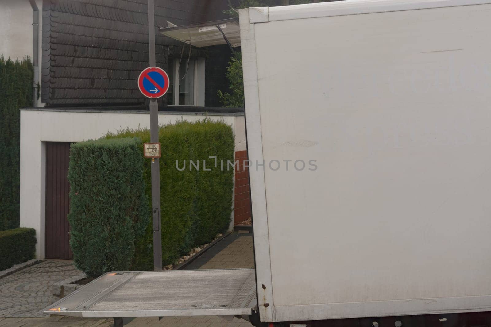 Logistics and transport of the freight industry, freight shipping, courier transport in the warehouse by truck, stack packaging of packaging boxes that wraps pallet loads in a truck in plastic..