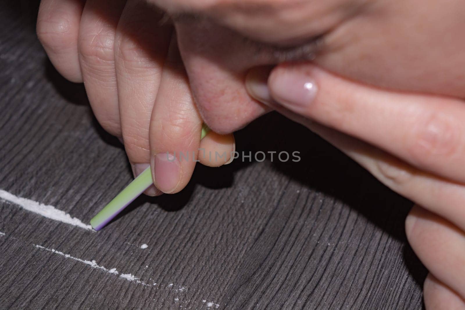 Substance abuse, drug use and sniffing cocaine powder, close-up