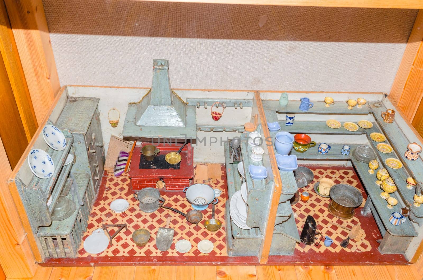 Old dollhouse. Cross-section of the house, view of the bedroom, living room and hallway