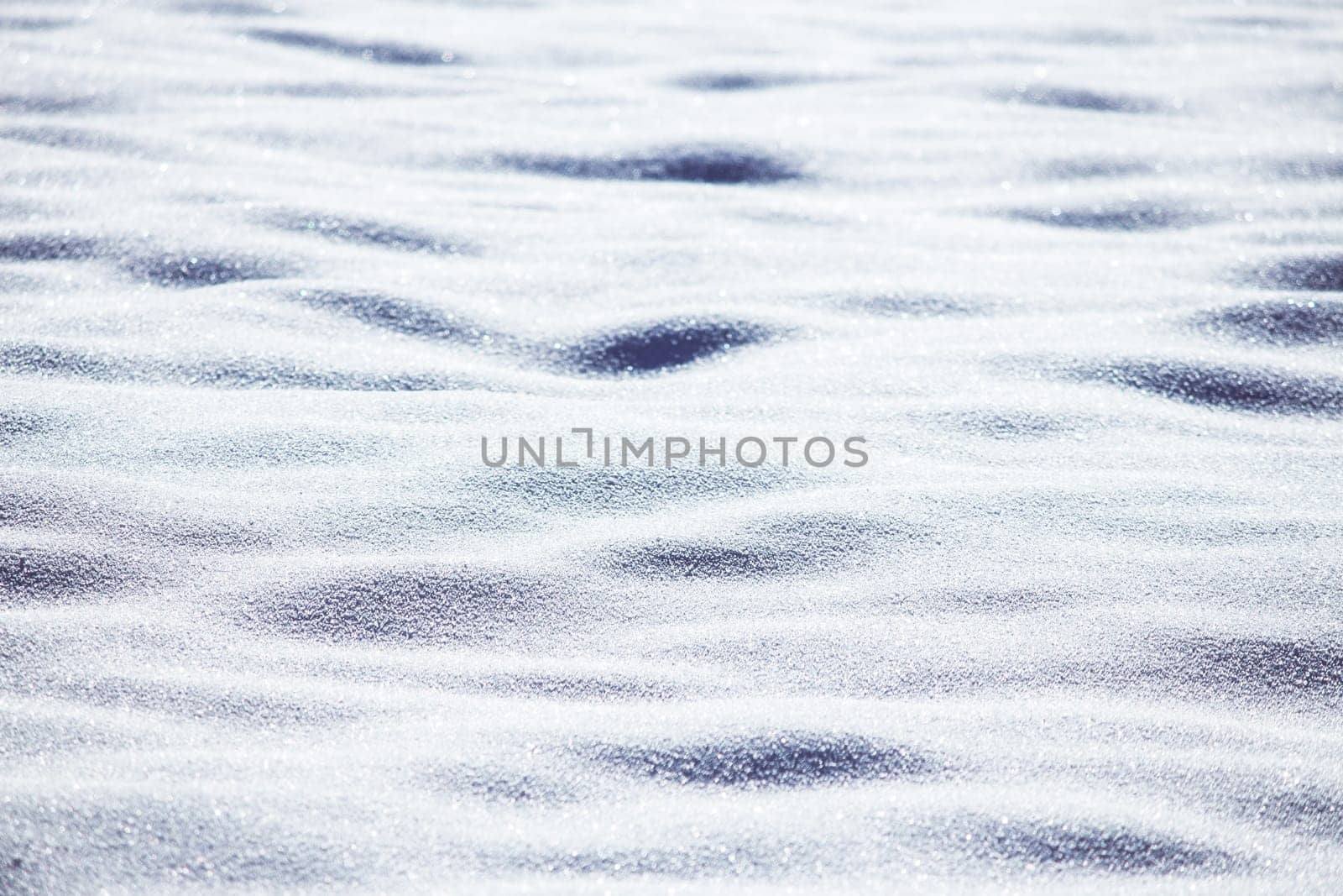 Close up of snow particles and flakes. Winter snow background