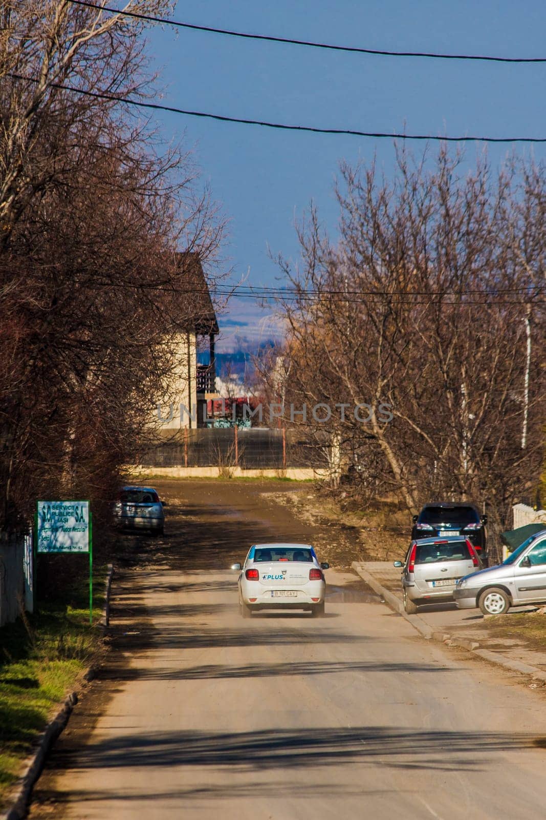 Iasi - Romania - 13th March 2021: Old road with cars. Vintage photo