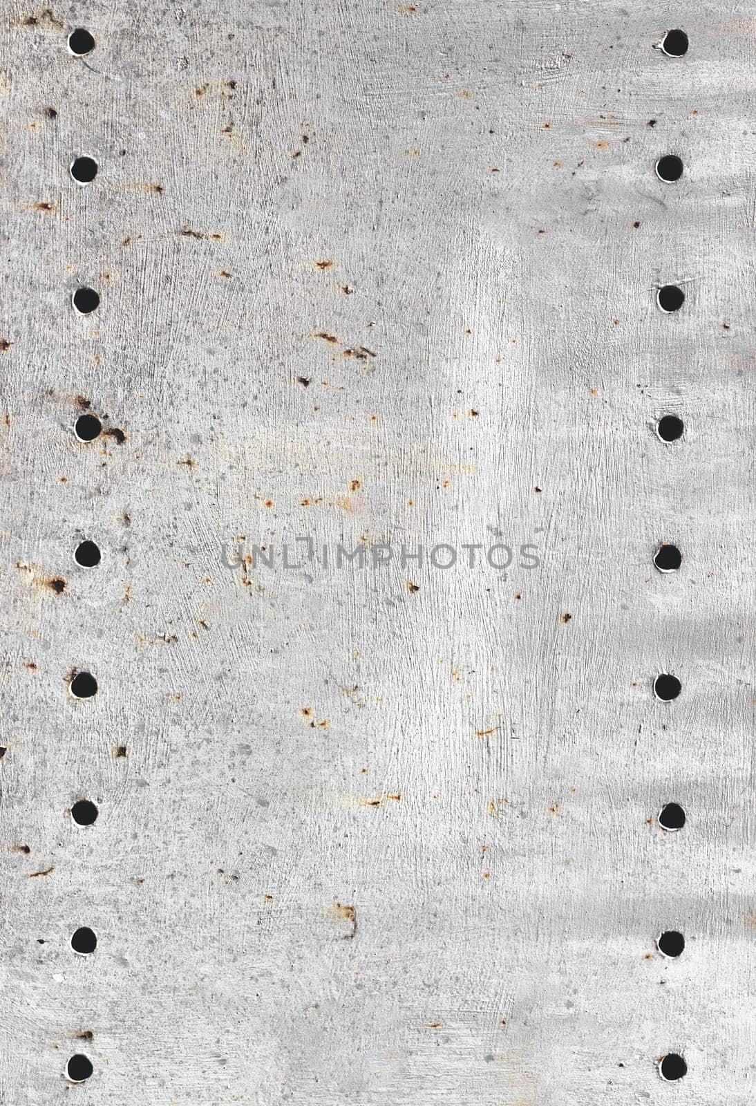 Gray metal structure, with holes. Scratched metal. Design background.
