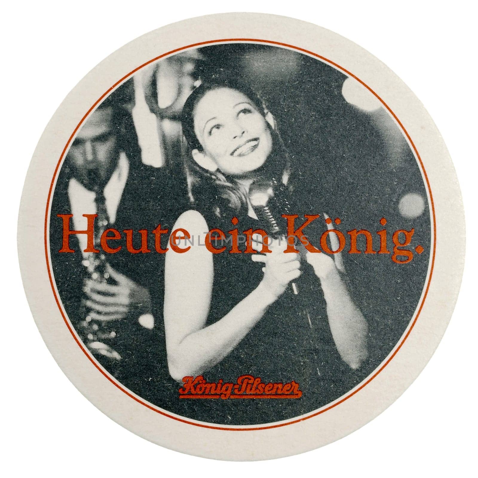BERLIN, GERMANY - MARCH 15, 2015: Beermat of German beer Koenig Pilsner isolated over white background