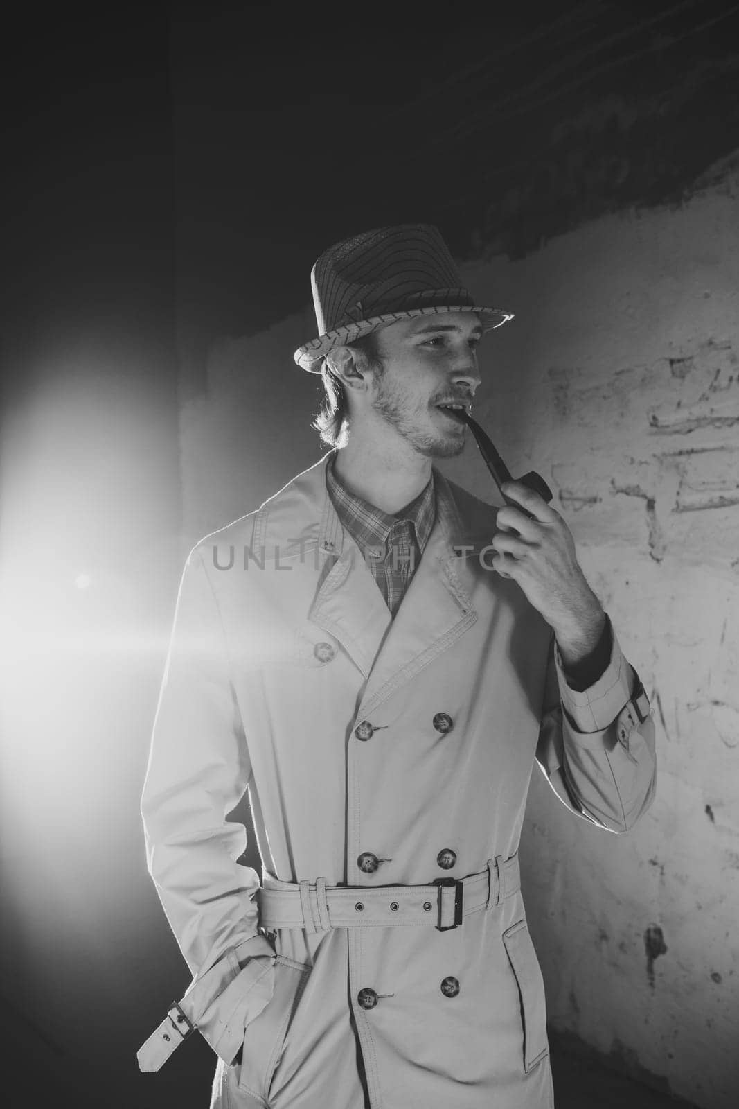 Black and white old-fashioned portrait of man with cigar