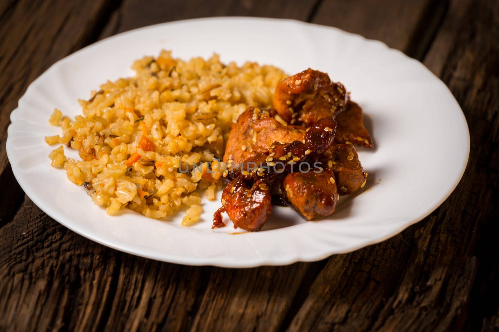 Delicious rice with chicken sauce, selective focus