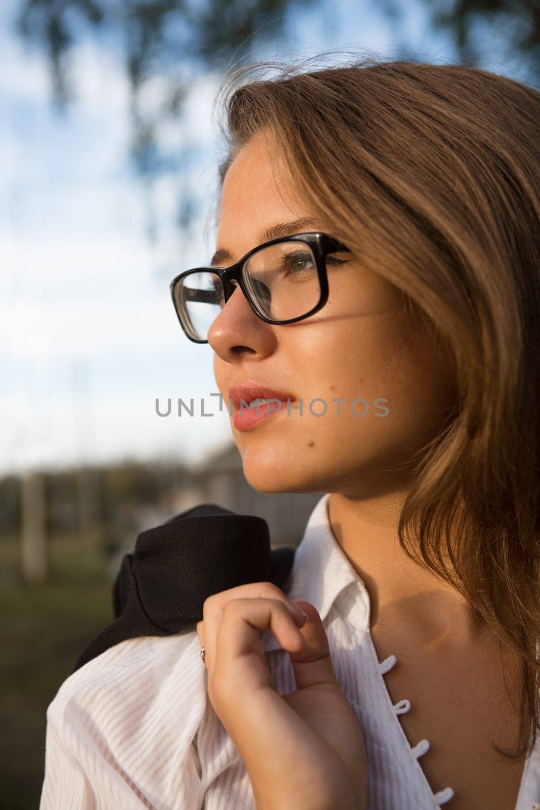 A beautiful young business woman walking outdoors