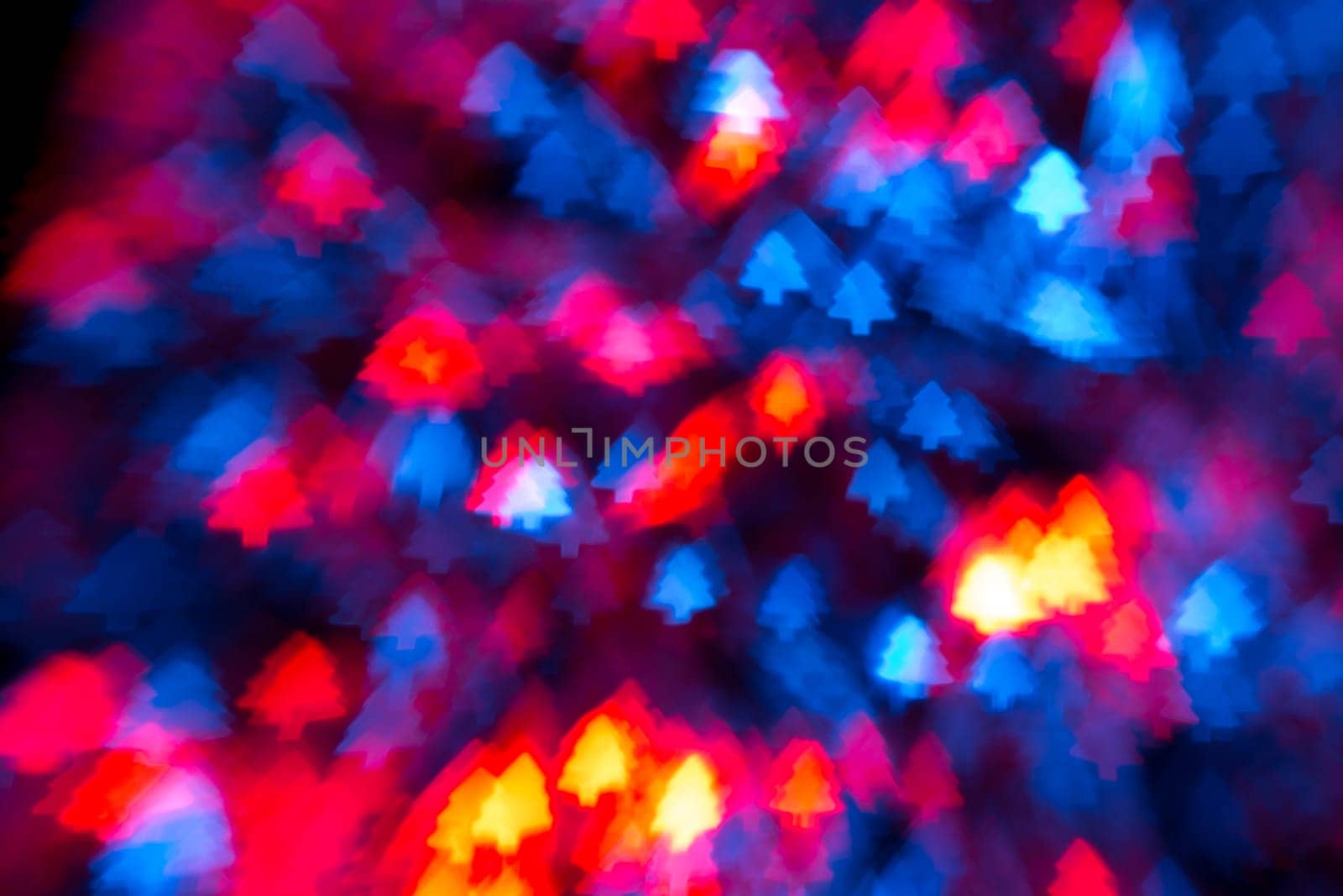 Christmas three bokeh from small light bulb