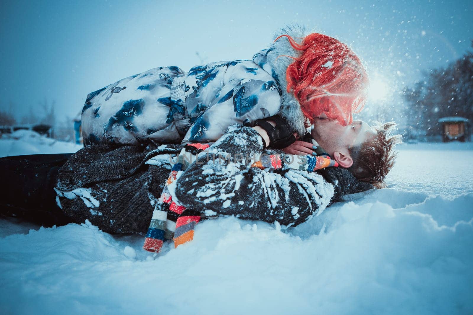 Happy Young Couple in Winter Park having fun.Family Outdoors. love kiss