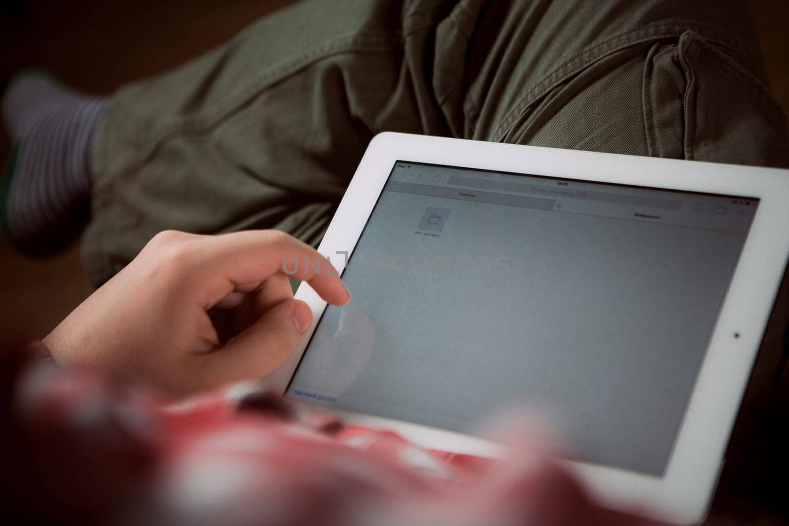 Adult man on tablet pc