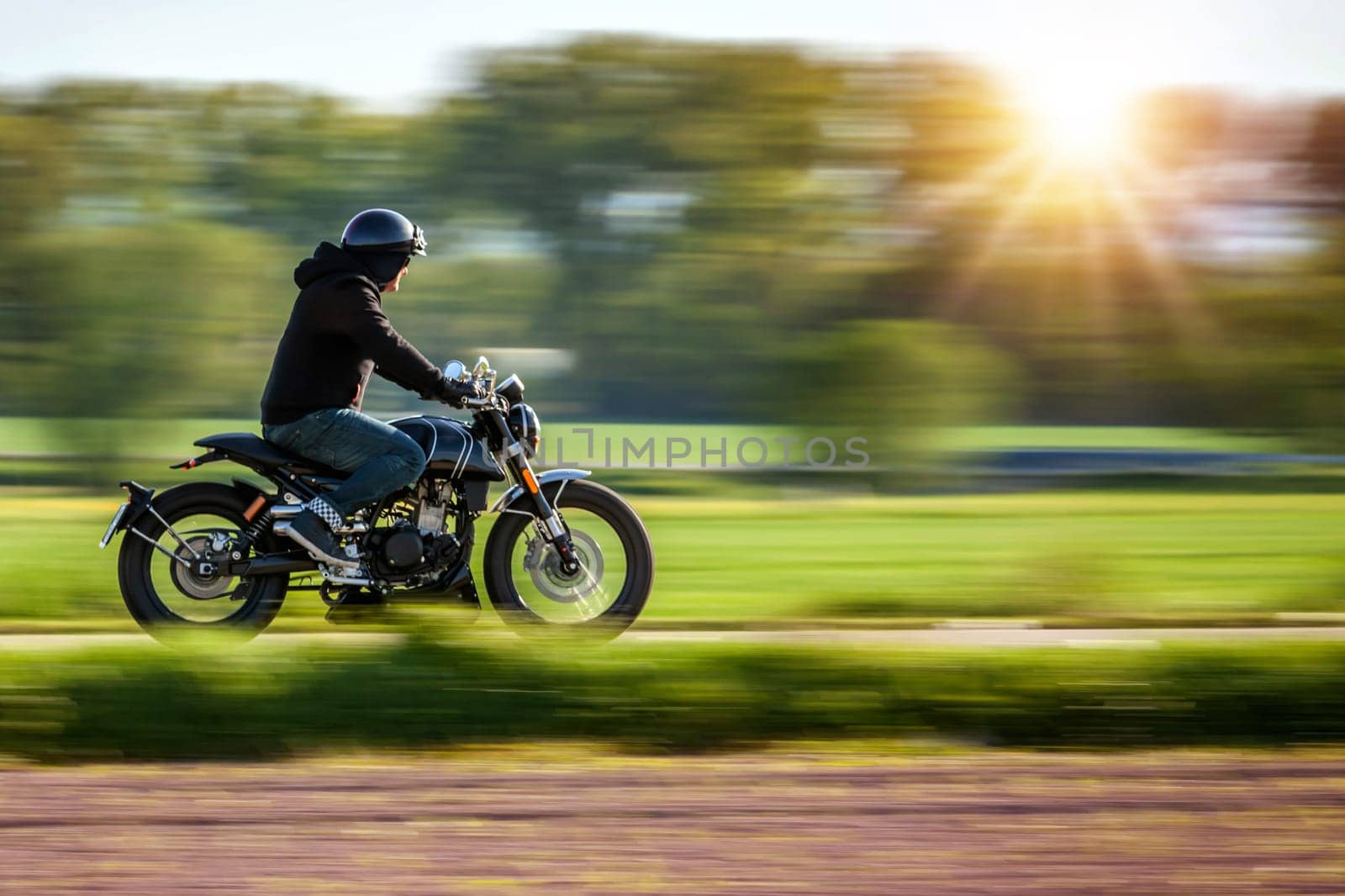 Riding motorcycle pan technic used., panning photo. copyspace for your individual text.