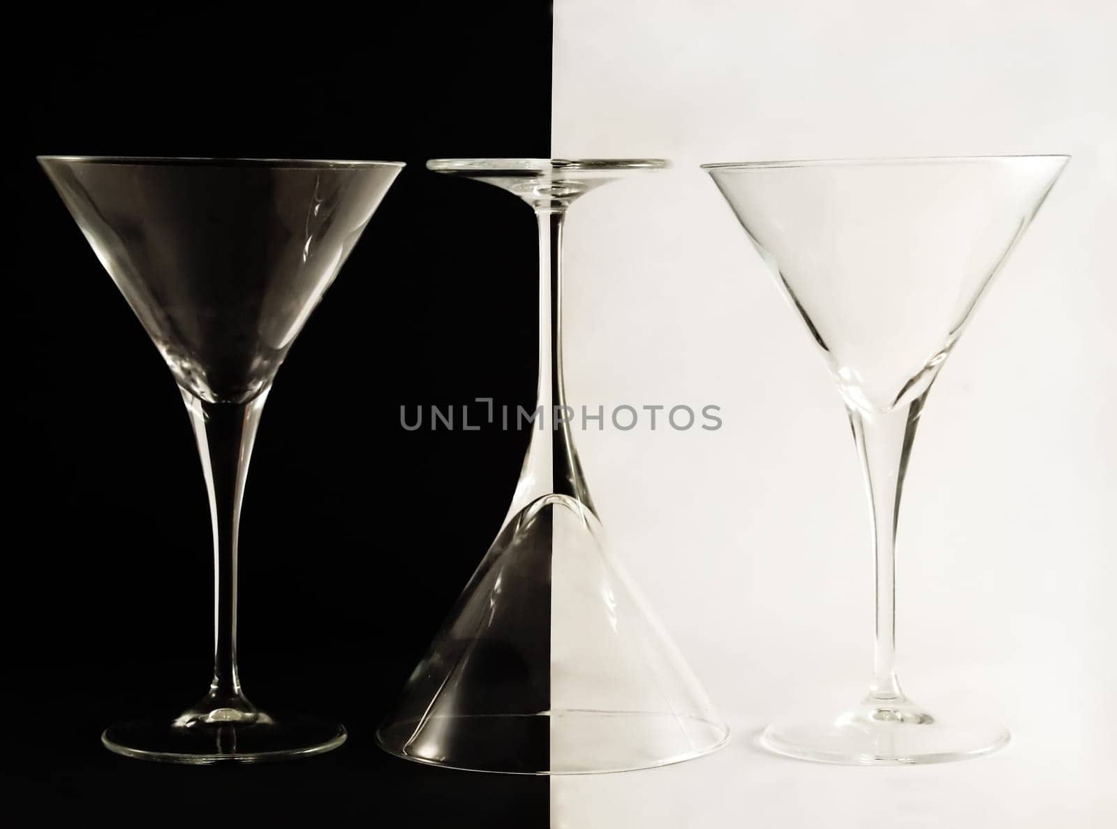 Three martini glasses on the black and white background