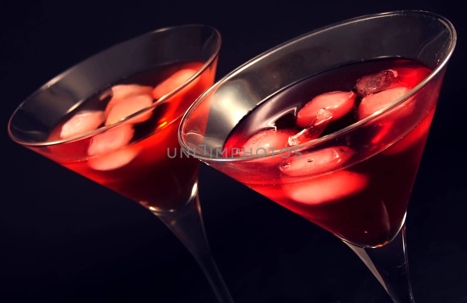 Two martini glasses with iced cocktails