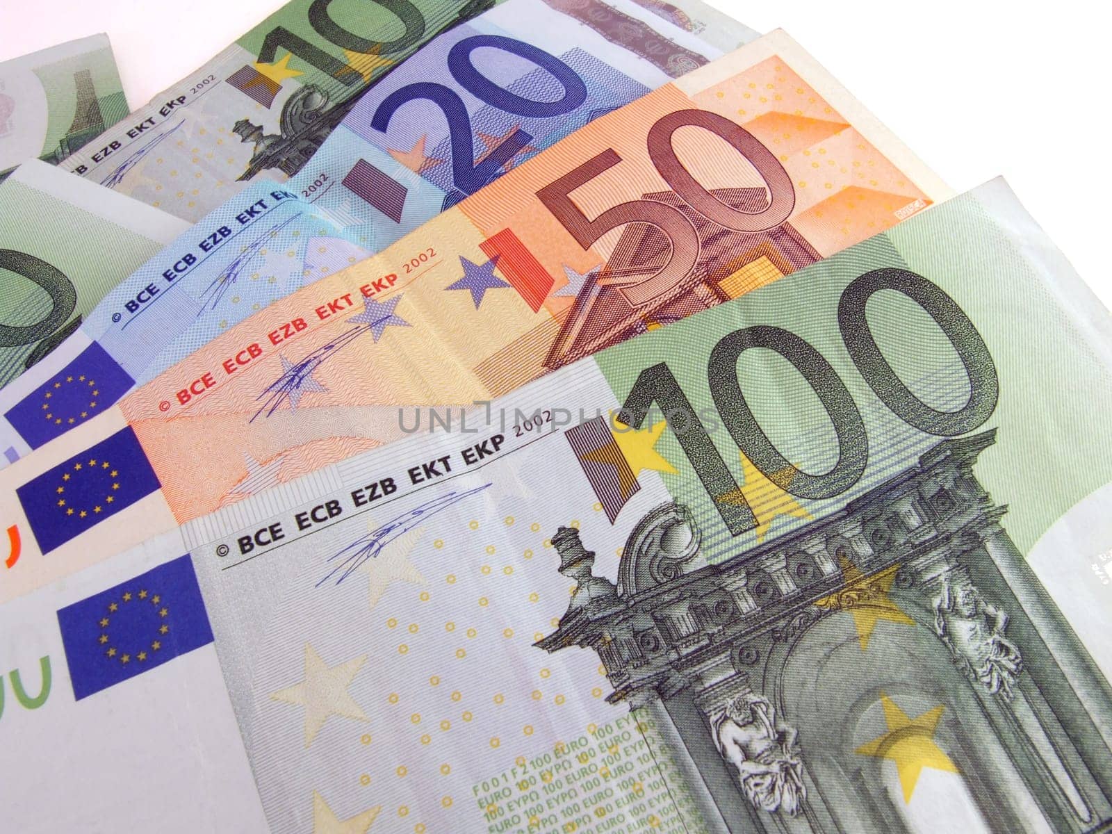 euro bills over white background